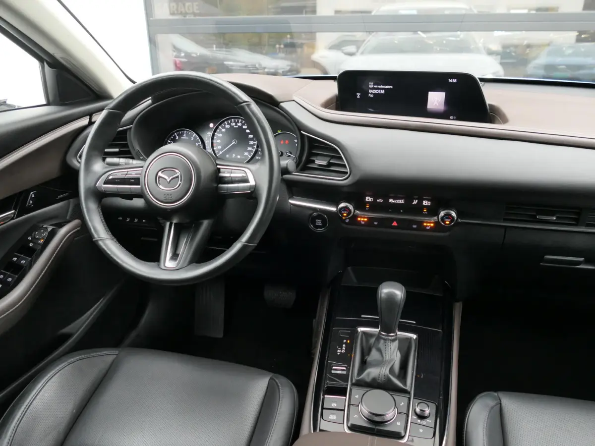 2.0 e-SkyActiv-G M Hybrid Sportive | BOSE | Head-up display | Leder | Memory | Elektrische achterklep | Apple-/Android Carplay | Dodehoek detectie | Stuur-/Stoelverwarming | Achteruitrijcame