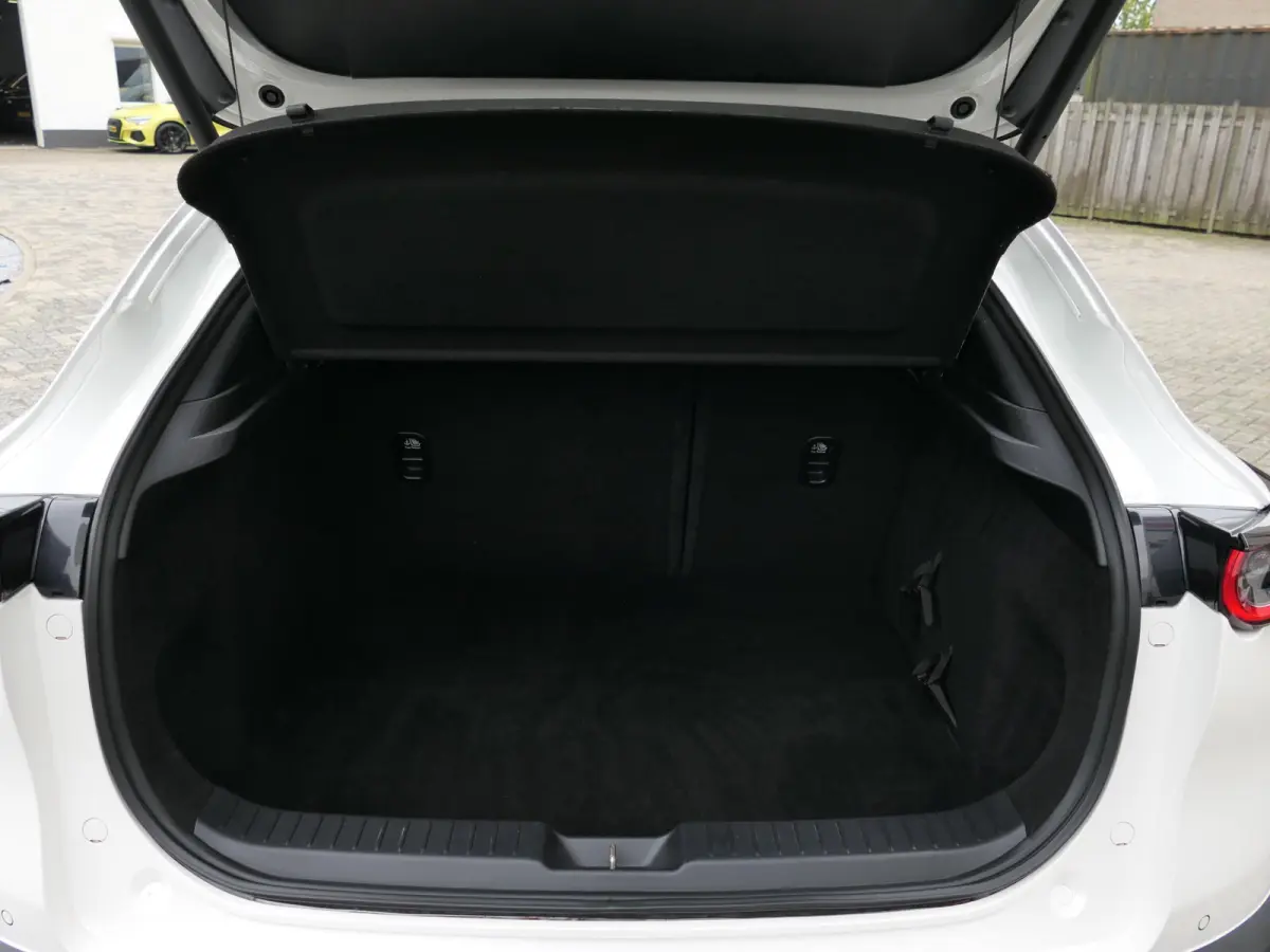 2.0 e-SkyActiv-G M Hybrid Sportive | BOSE | Head-up display | Leder | Memory | Elektrische achterklep | Apple-/Android Carplay | Dodehoek detectie | Stuur-/Stoelverwarming | Achteruitrijcame