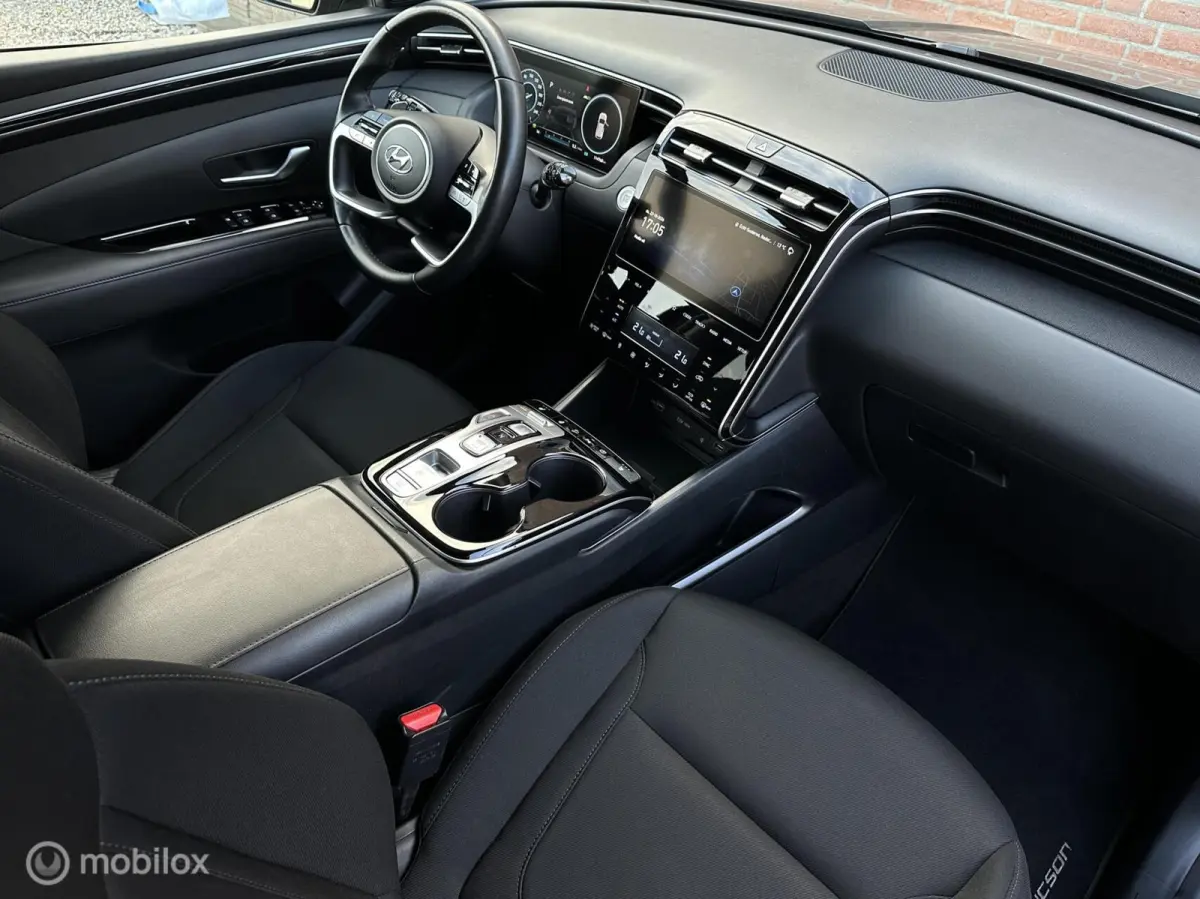 1.6 T-GDI PHEV Hybride Comfort 4WD | Stoelverw. | Stuurverw. | Camera | Apple CarPlay | Afneembare trekhaak