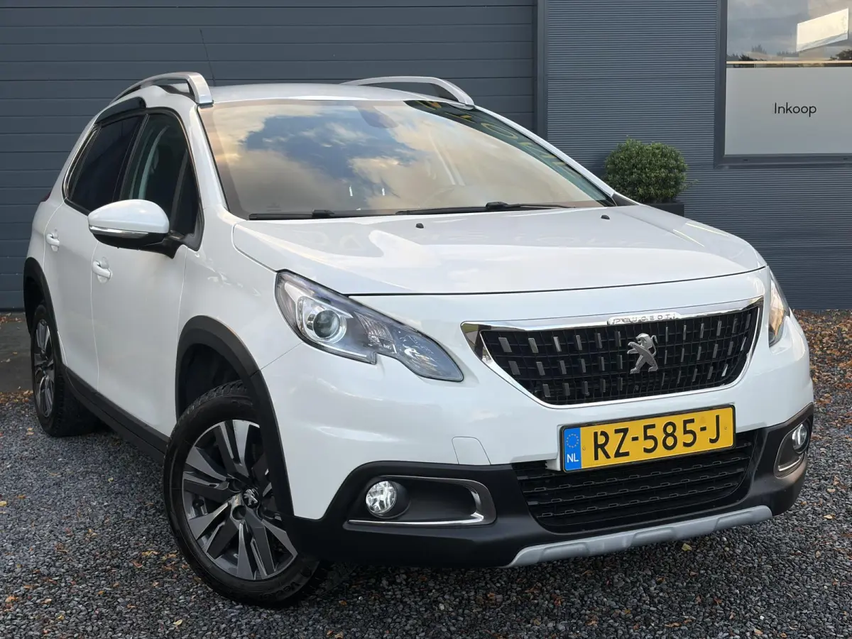 1.2 PureTech Allure ✓Camera✓Navi✓Carplay✓Halfleder✓110pk✓Dealer Onderhouden✓Clima✓Cruise✓Pdc✓Lm velgen✓Automaat✓N.A.P✓Apk tot 03-2027