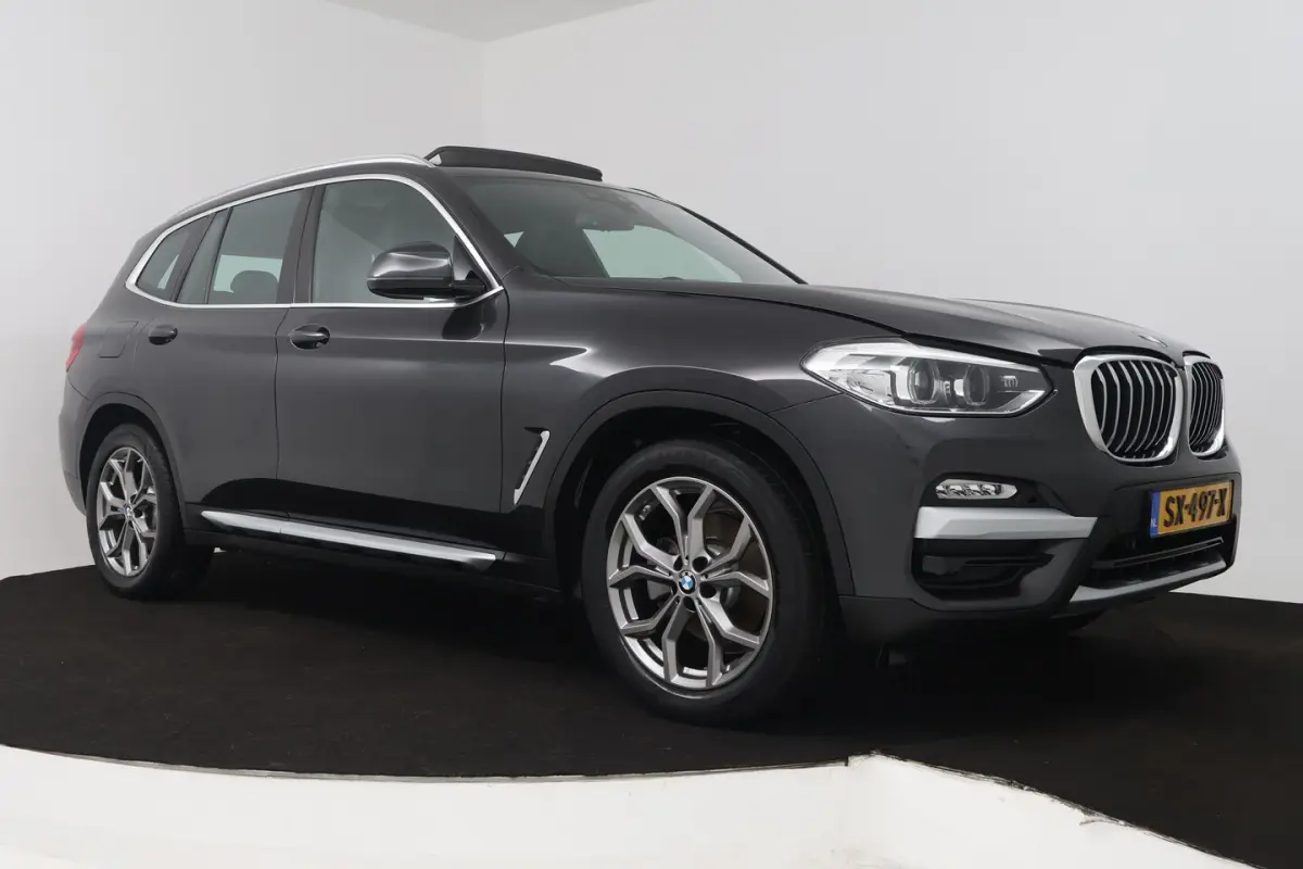 XDrive20i High Executive (PANORAMADAK, DIGITALE COCKPIT, STOELVERWARMING, NAVIGATIE)