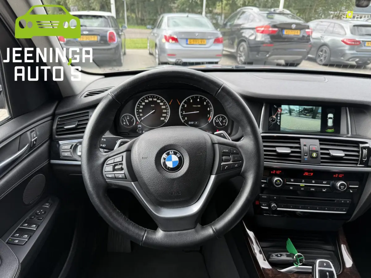 xDrive28i High Executive |Memory|Stuurverwarming|Camera|Leer