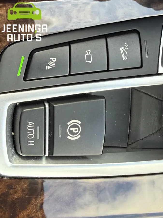 xDrive28i High Executive |Memory|Stuurverwarming|Camera|Leer