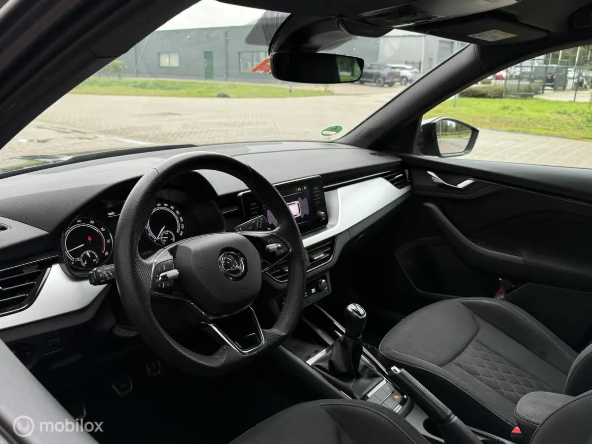 1.0 TSI Sport Business CarPlay | Trekhaak | Camera | Stoelverwarming