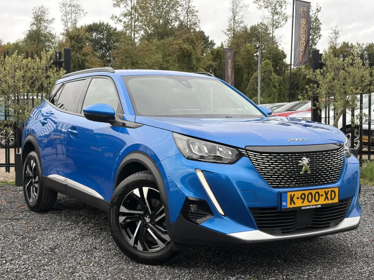 1.2 PureTech Blue Lease Allure ✓2e Eigenaar✓360° Camera✓Draadloze telefoonlader✓Carplay✓6 bak✓Halfleder✓Navi✓Clima✓Cruise✓17'' Lmv✓Rijstrooksensor✓102pk✓Dealer ond