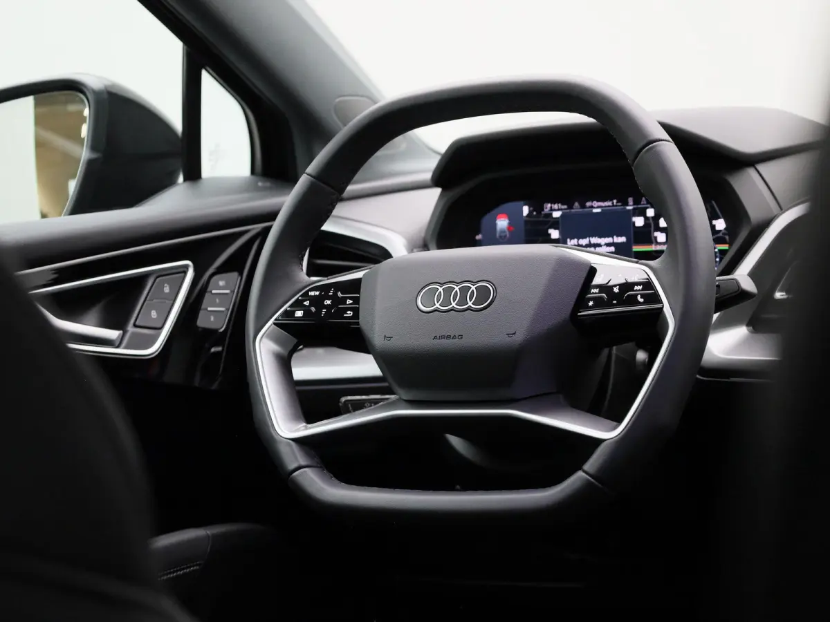50 quattro Advanced edition 77 kWh 299 PK | Navigatie | Stoel + stuurverwarming | Comfortpakket Plus | Achteruitrijcamera | SONOS Premium geluidsysteem | Optiek Pakket Zwart | Privacy Glass 