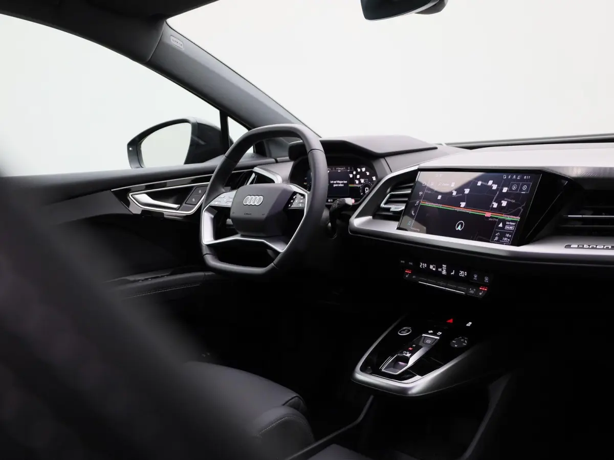 50 quattro Advanced edition 77 kWh 299 PK | Navigatie | Stoel + stuurverwarming | Comfortpakket Plus | Achteruitrijcamera | SONOS Premium geluidsysteem | Optiek Pakket Zwart | Privacy Glass 