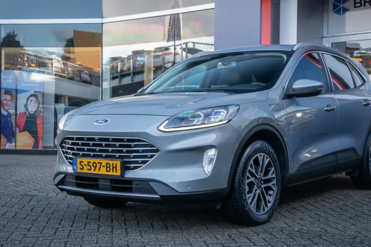 2.5 PHEV Titanium X | Trekhaak | Camera V+A | B&O audio | Adap.cruise | Elc.stoelen | Elektrisch bedienbare achterklep | Apple Carplay/Android Auto | Achteruitrijcamera | Apple Carplay/Andro