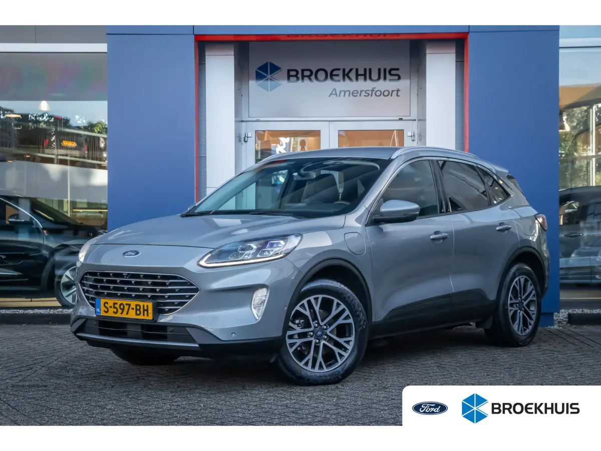 2.5 PHEV Titanium X | Trekhaak | Camera V+A | B&O audio | Adap.cruise | Elc.stoelen | Elektrisch bedienbare achterklep | Apple Carplay/Android Auto | Achteruitrijcamera | Apple Carplay/Andro