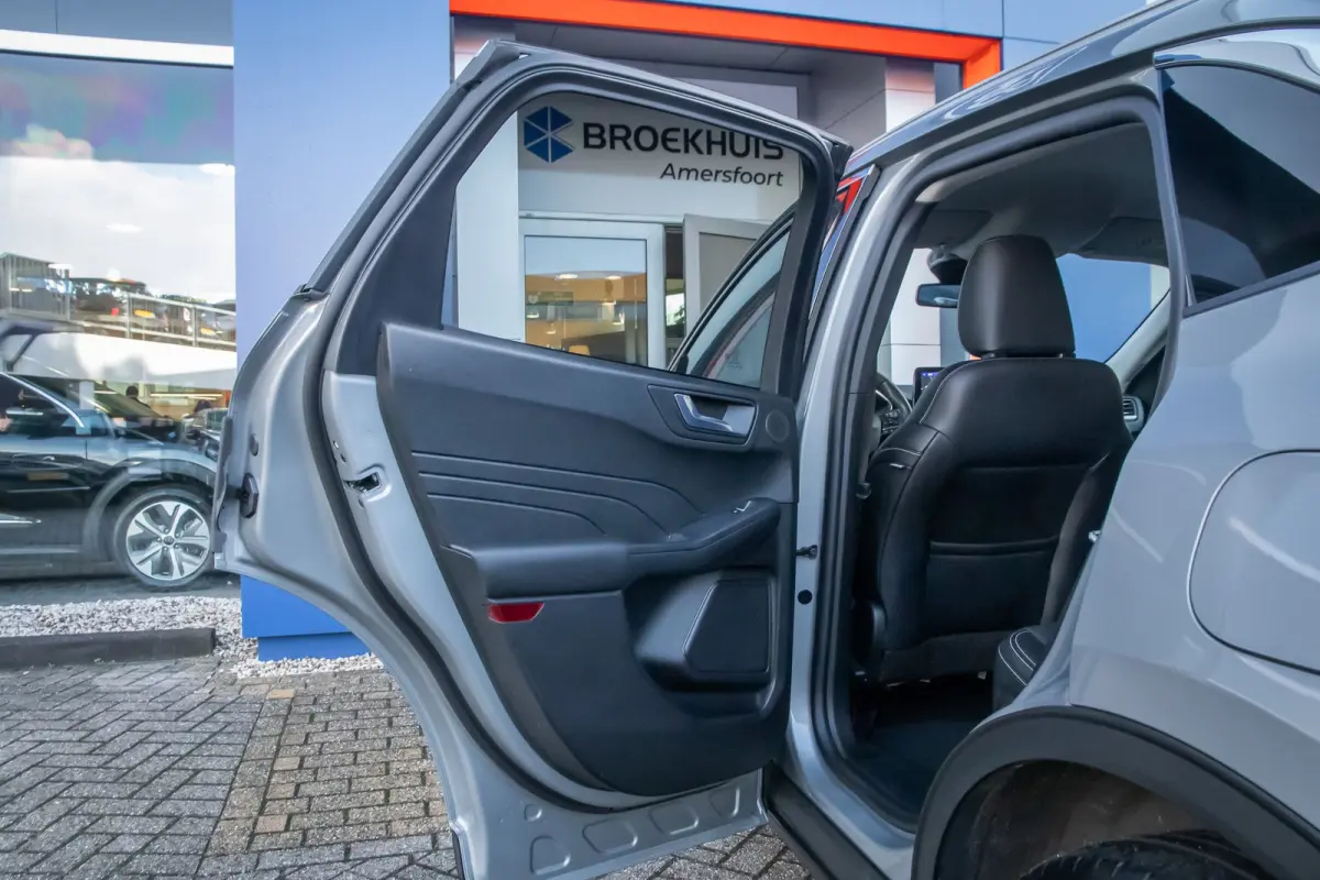 2.5 PHEV Titanium X | Trekhaak | Camera V+A | B&O audio | Adap.cruise | Elc.stoelen | Elektrisch bedienbare achterklep | Apple Carplay/Android Auto | Achteruitrijcamera | Apple Carplay/Andro