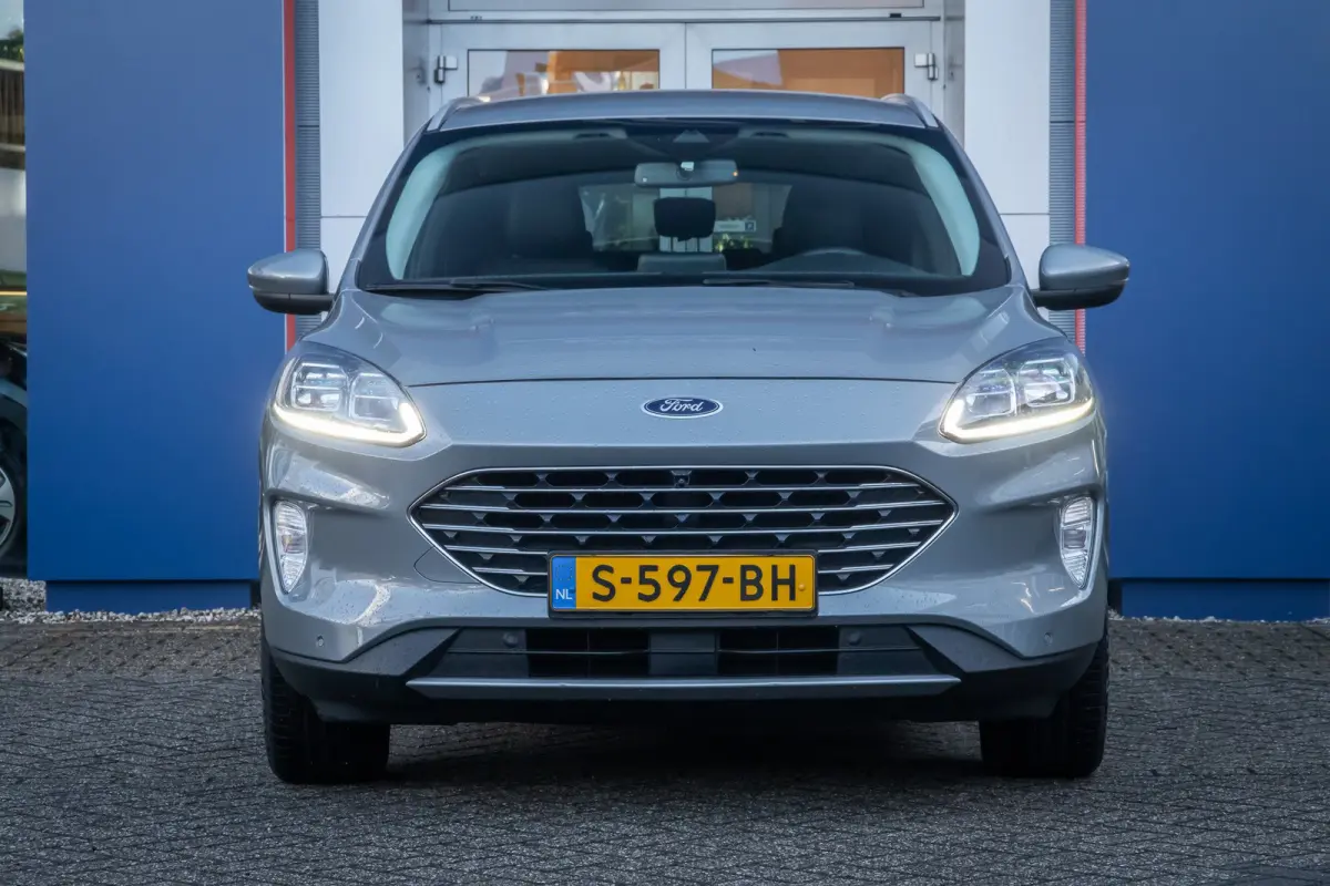 2.5 PHEV Titanium X | Trekhaak | Camera V+A | B&O audio | Adap.cruise | Elc.stoelen | Elektrisch bedienbare achterklep | Apple Carplay/Android Auto | Achteruitrijcamera | Apple Carplay/Andro