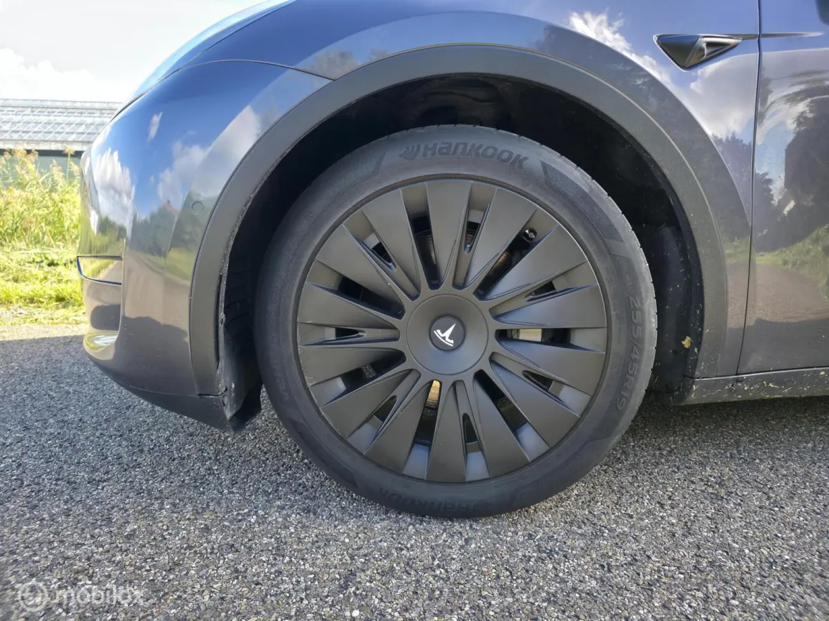Long Range AWD 75 kWh / Trekhaak / Leder