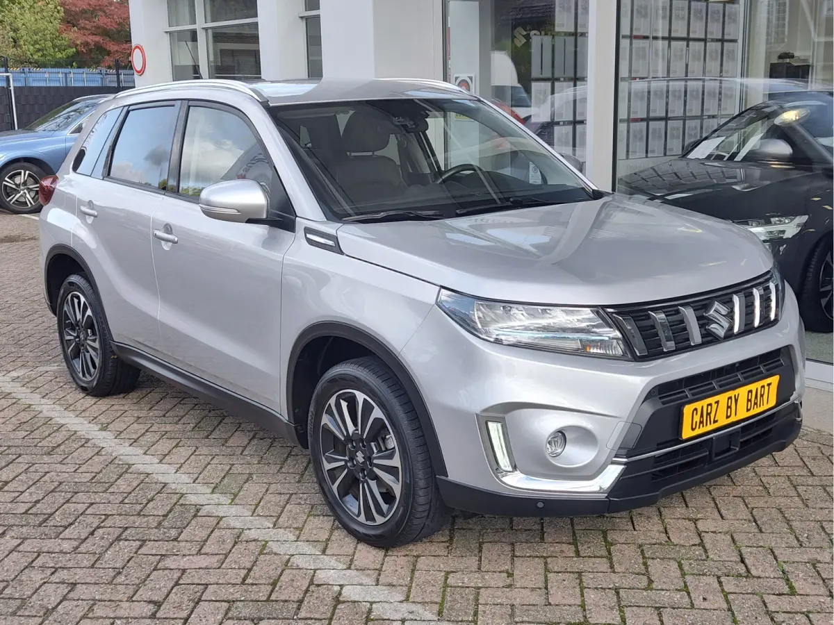 1.5 HYBRID STYLE AUTOMAAT Keyless | Dodehoeksensoren | Navi | Adaptive Cruise
