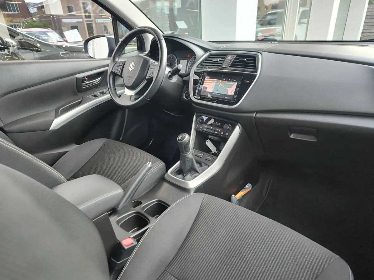 1.0 BOOSTERJET EXCLUSIVE Navi | Stoelverwarming | Trekhaak | Keyless | Camera