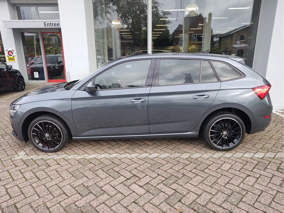 1.0 TSI SPORT BUSINESS Cruise | Camera | Draadloze lader | Android/Carplay