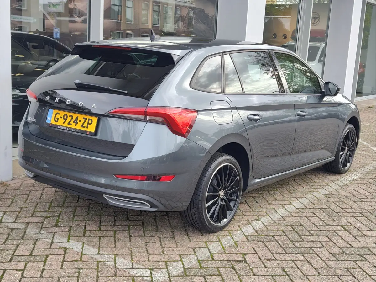 1.0 TSI SPORT BUSINESS Cruise | Camera | Draadloze lader | Android/Carplay