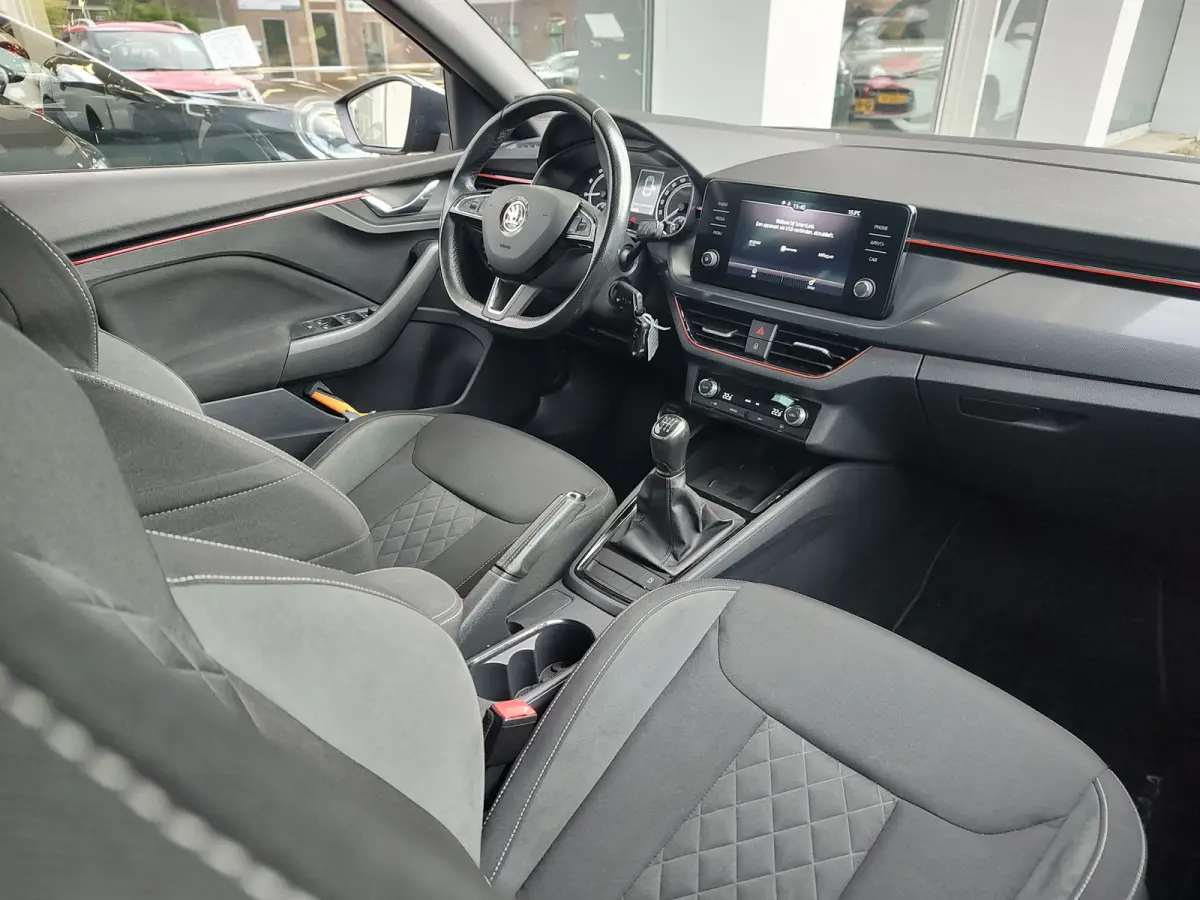 1.0 TSI SPORT BUSINESS Cruise | Camera | Draadloze lader | Android/Carplay