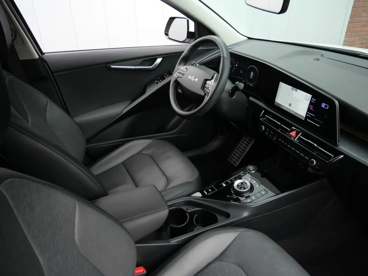 Plus 64.8 kWh 204 Pk Automaat Navi / DAB / Camera / Leer / Apple Carplay / SOH 98,3%
