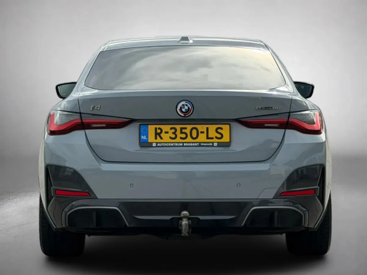 EDrive40 84 kWh M-sport 94% SOH (NL-auto,1e eig, Dealer OndH, Carplay, SfeerV, Trekhaak,Camera, Lane A, Active Cruise, Etc)