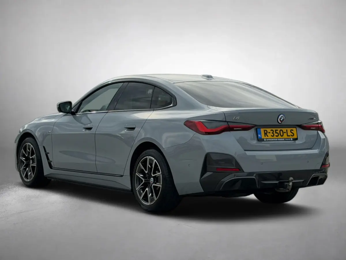 EDrive40 84 kWh M-sport 94% SOH (NL-auto,1e eig, Dealer OndH, Carplay, SfeerV, Trekhaak,Camera, Lane A, Active Cruise, Etc)