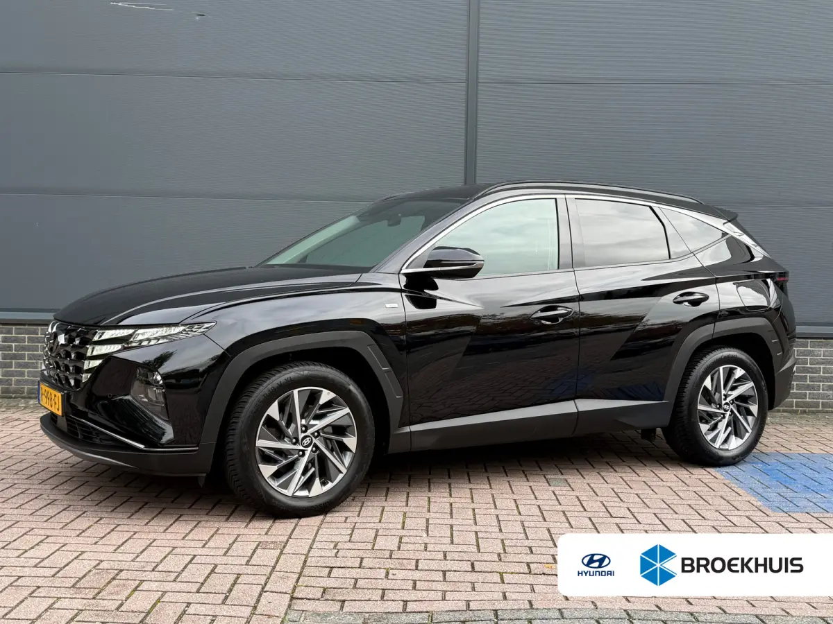 1.6 T-GDI MHEV Comfort Smart / Navigatiesysteem / Achteruitrijcamera / Apple CarPlay & Android Auto / Digitaal instrumentenpaneel / Cruise control / Climate control / Parkeersensoren voor en