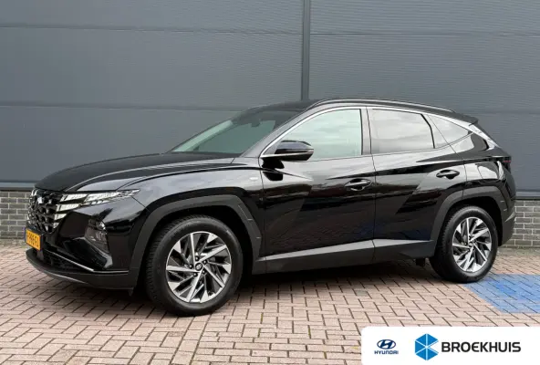 1.6 T-GDI MHEV Comfort Smart / Navigatiesysteem / Achteruitrijcamera / Apple CarPlay & Android Auto / Digitaal instrumentenpaneel / Cruise control / Climate control / Parkeersensoren voor en