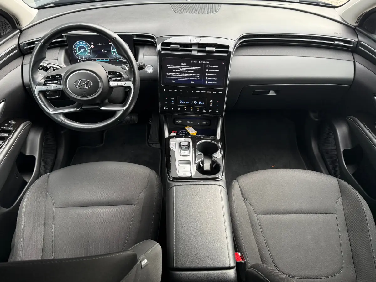 1.6 T-GDI MHEV Comfort Smart / Navigatiesysteem / Achteruitrijcamera / Apple CarPlay & Android Auto / Digitaal instrumentenpaneel / Cruise control / Climate control / Parkeersensoren voor en