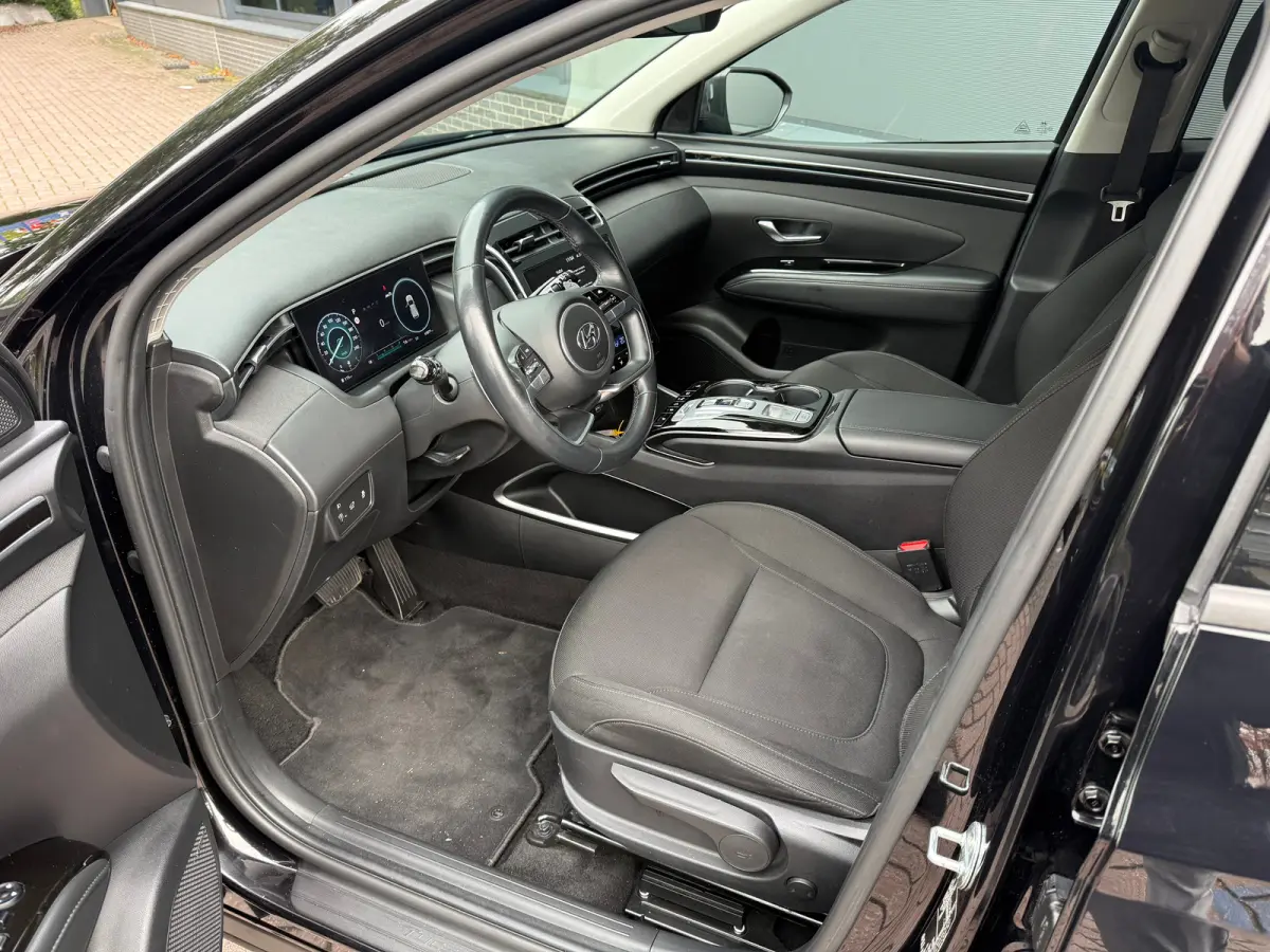 1.6 T-GDI MHEV Comfort Smart / Navigatiesysteem / Achteruitrijcamera / Apple CarPlay & Android Auto / Digitaal instrumentenpaneel / Cruise control / Climate control / Parkeersensoren voor en