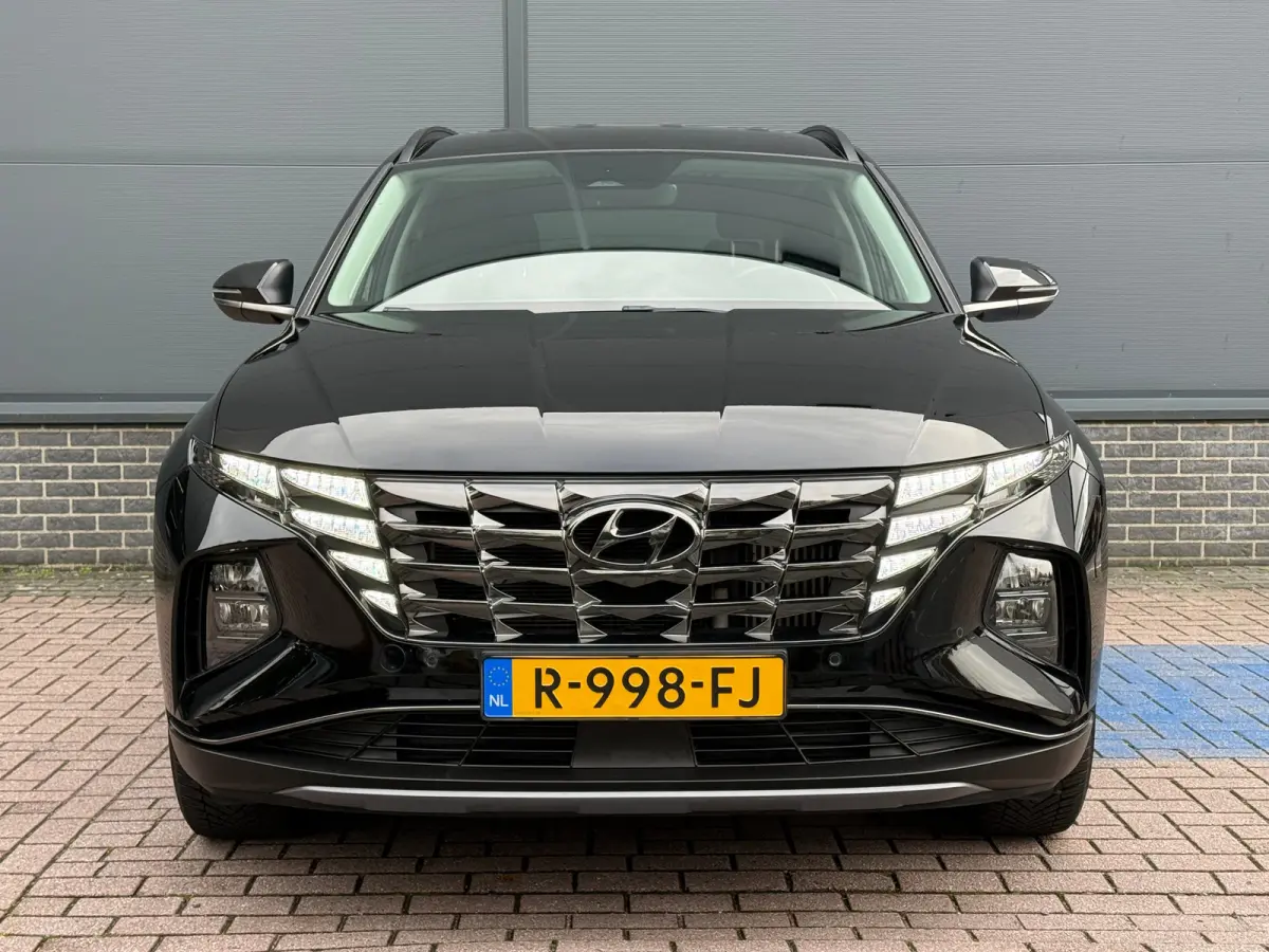 1.6 T-GDI MHEV Comfort Smart / Navigatiesysteem / Achteruitrijcamera / Apple CarPlay & Android Auto / Digitaal instrumentenpaneel / Cruise control / Climate control / Parkeersensoren voor en