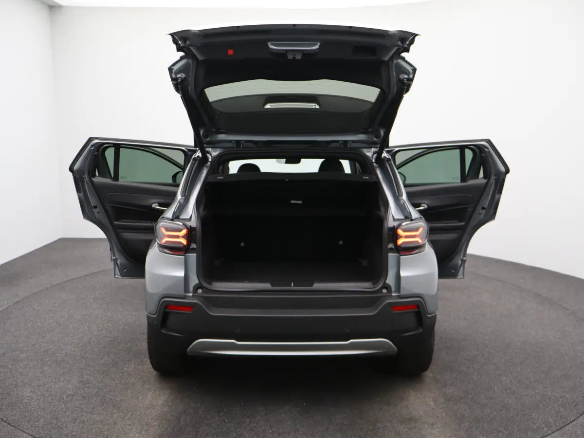 Summit 54 kWh 98% SOH | Tot 8 Jaar Fabrieksgarantie | Carplay Draadloos | Stoelverwarming | Camera | PDC V+A | Keyless | Voorconditionering | Origineel NL!