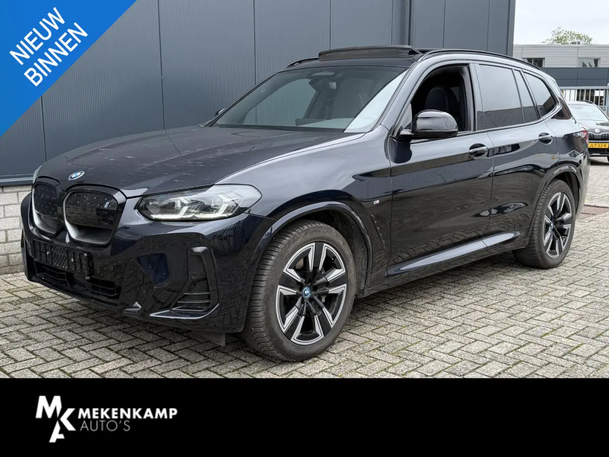 Executive M Sport 80 kWh 19"/SOH 99,9%/Panoramadak/Leder + memory/Stoelverwarming/Dodehoek/Elektrische klep/Camera/Adaptieve cruise/Apple Carplay & Android Auto