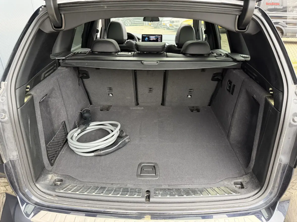 Executive M Sport 80 kWh 19"/SOH 99,9%/Panoramadak/Leder + memory/Stoelverwarming/Dodehoek/Elektrische klep/Camera/Adaptieve cruise/Apple Carplay & Android Auto