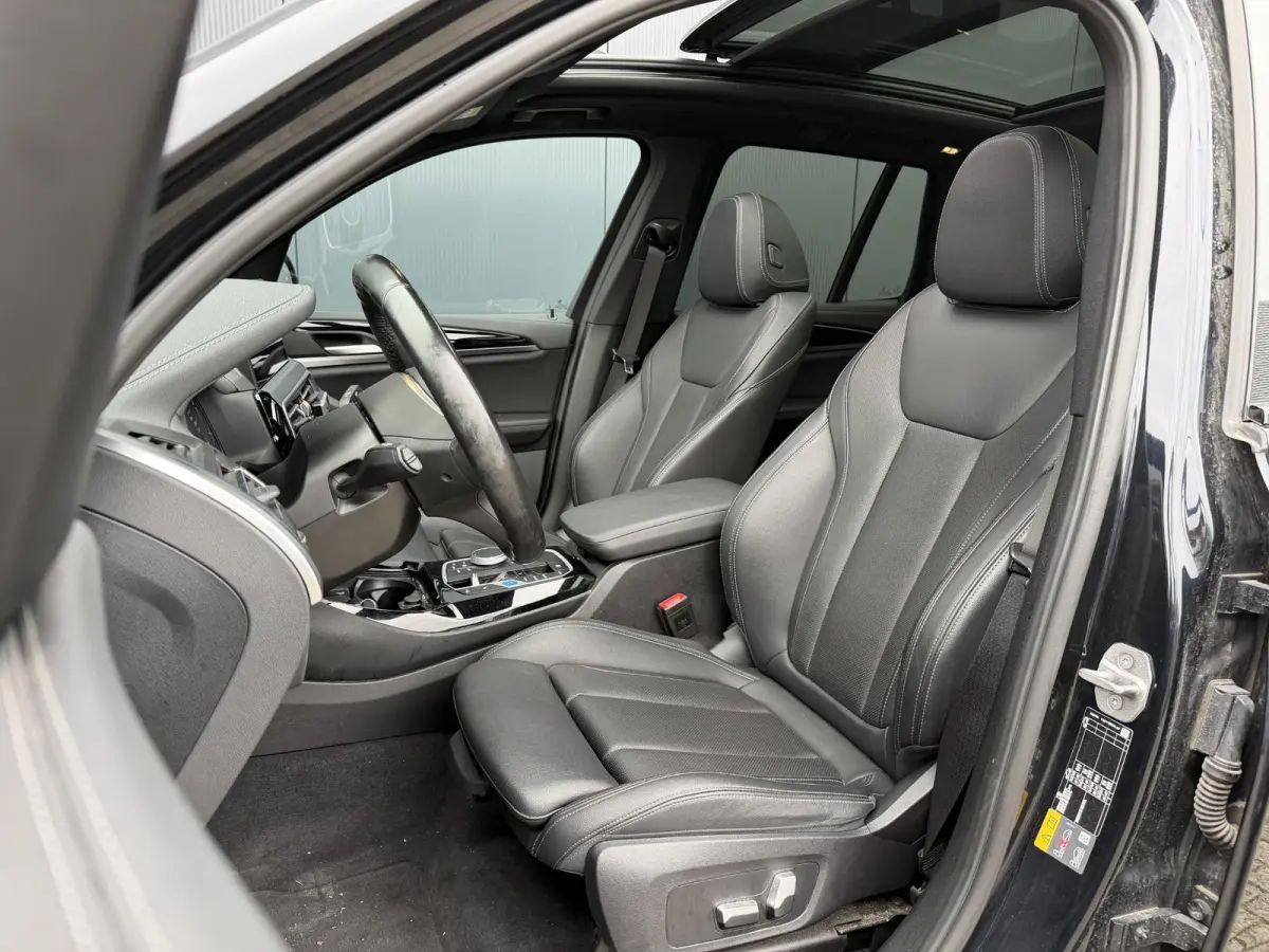 Executive M Sport 80 kWh 19"/SOH 99,9%/Panoramadak/Leder + memory/Stoelverwarming/Dodehoek/Elektrische klep/Camera/Adaptieve cruise/Apple Carplay & Android Auto