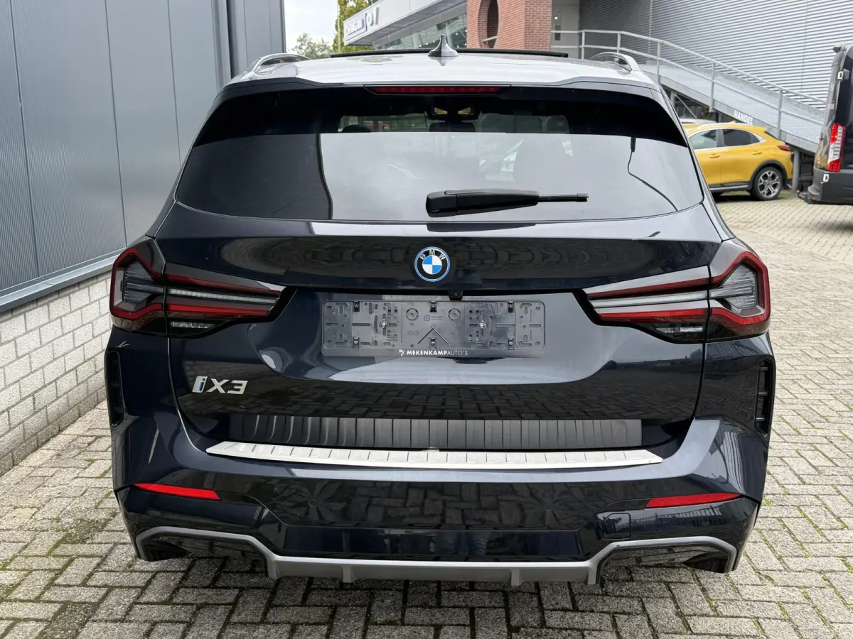 Executive M Sport 80 kWh 19"/SOH 99,9%/Panoramadak/Leder + memory/Stoelverwarming/Dodehoek/Elektrische klep/Camera/Adaptieve cruise/Apple Carplay & Android Auto