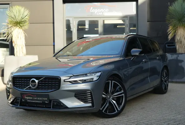 2.0 T6 Recharge AWD R-Design | 340 PK | Panoramadak | Harman Kardon | 360° camera | Trekhaak | Volvo V60 2.0 T6 Recharge AWD R-Design met 340 PK, een 2.0-liter viercilinder plug-in hybride 