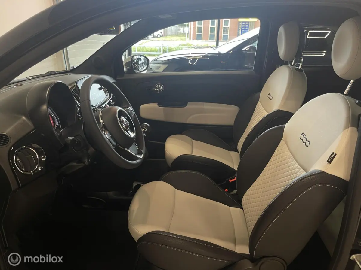 1.0 Hybrid Dolcevita | 3.056 KM | Digitaal Dashboard | Glazen Dak | 16” LM | Cruise