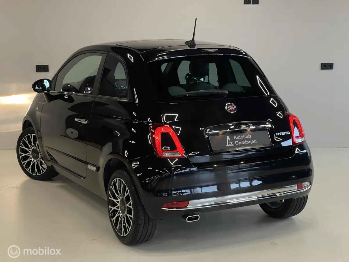 1.0 Hybrid Dolcevita | 3.056 KM | Digitaal Dashboard | Glazen Dak | 16” LM | Cruise