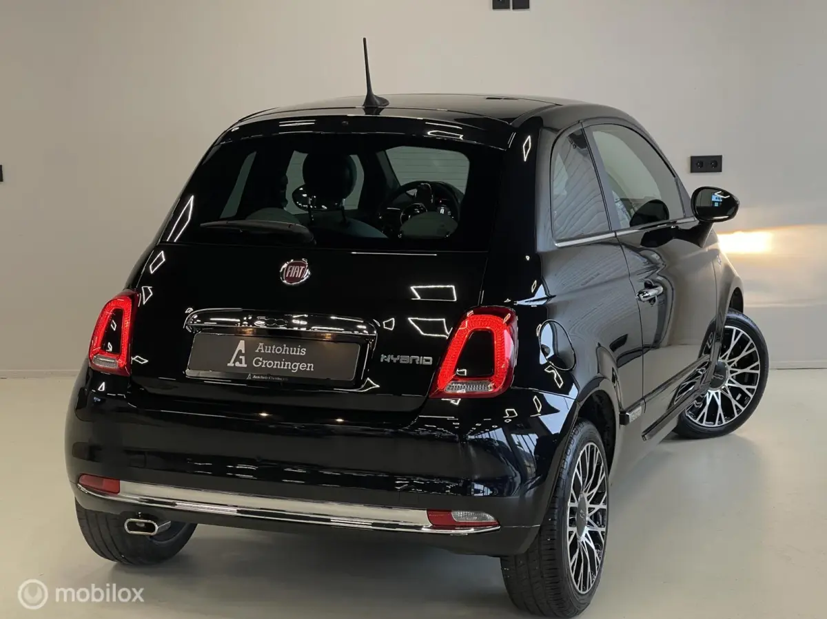 1.0 Hybrid Dolcevita | 3.056 KM | Digitaal Dashboard | Glazen Dak | 16” LM | Cruise