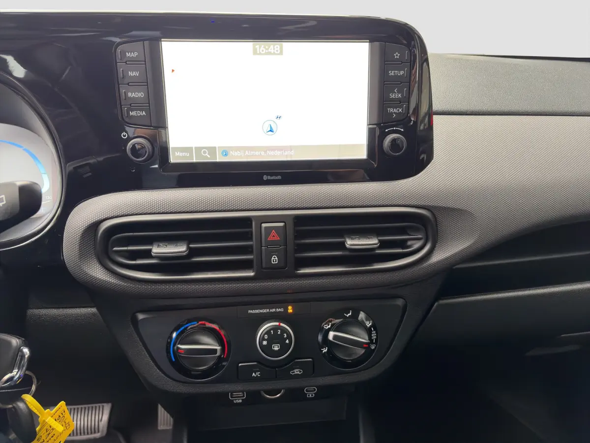 1.0 63pk Automaat Comfort Smart | Carplay | Navigatie | Airco | Camera | Cruise control | Parkeersensoren | Armsteun | Bluetooth