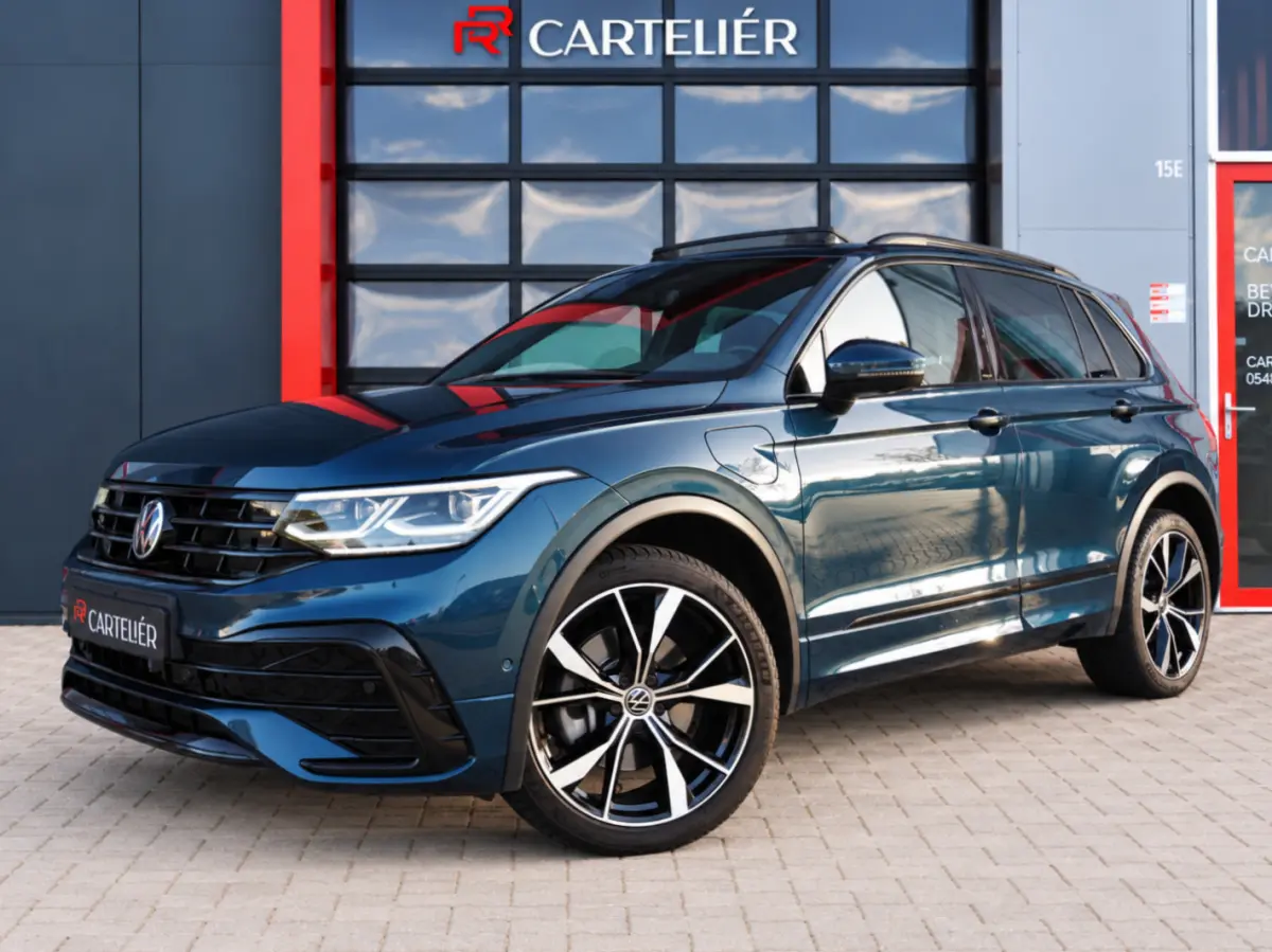 1.4 TSI eHybrid R-Line 245PK | Leder | 360 | Pano | Keyless | Memory | Stoel & Stuurwielverwarming | Trekhaak | Adaptive | Digital Dash | Lane Assist | Matrix IQ Led | Carplay | Navi | Ambie