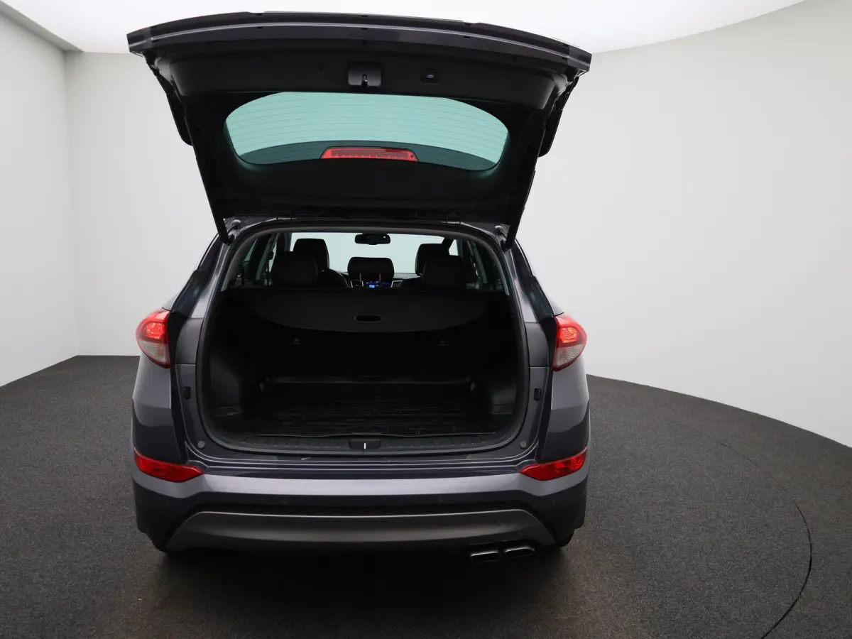 1.6 T-GDi Premium 4WD | Automaat | Achteruitrijcamera | Parkeersensoren | Panoramadak | Panoramadak | Stoelverwarming | Stuurverwarming |