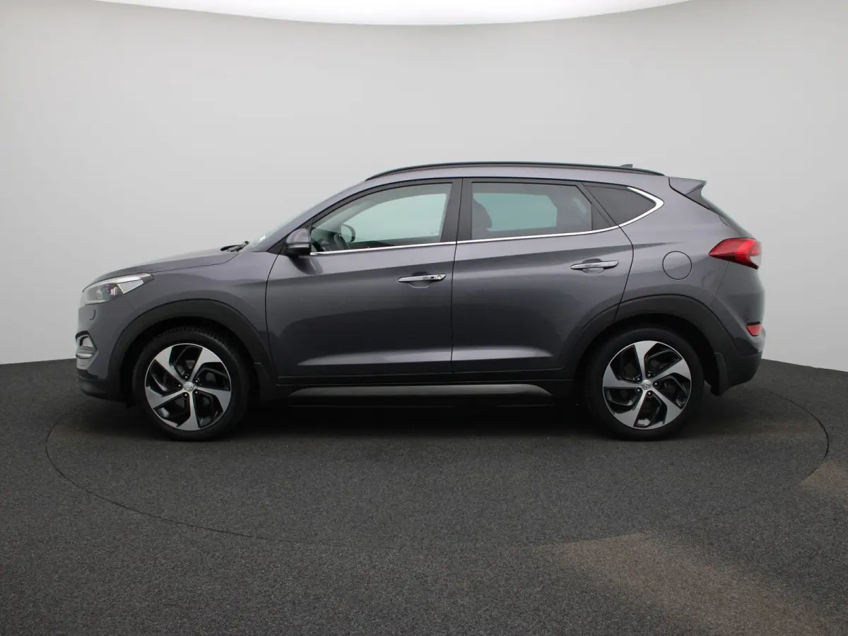 1.6 T-GDi Premium 4WD | Automaat | Achteruitrijcamera | Parkeersensoren | Panoramadak | Panoramadak | Stoelverwarming | Stuurverwarming |