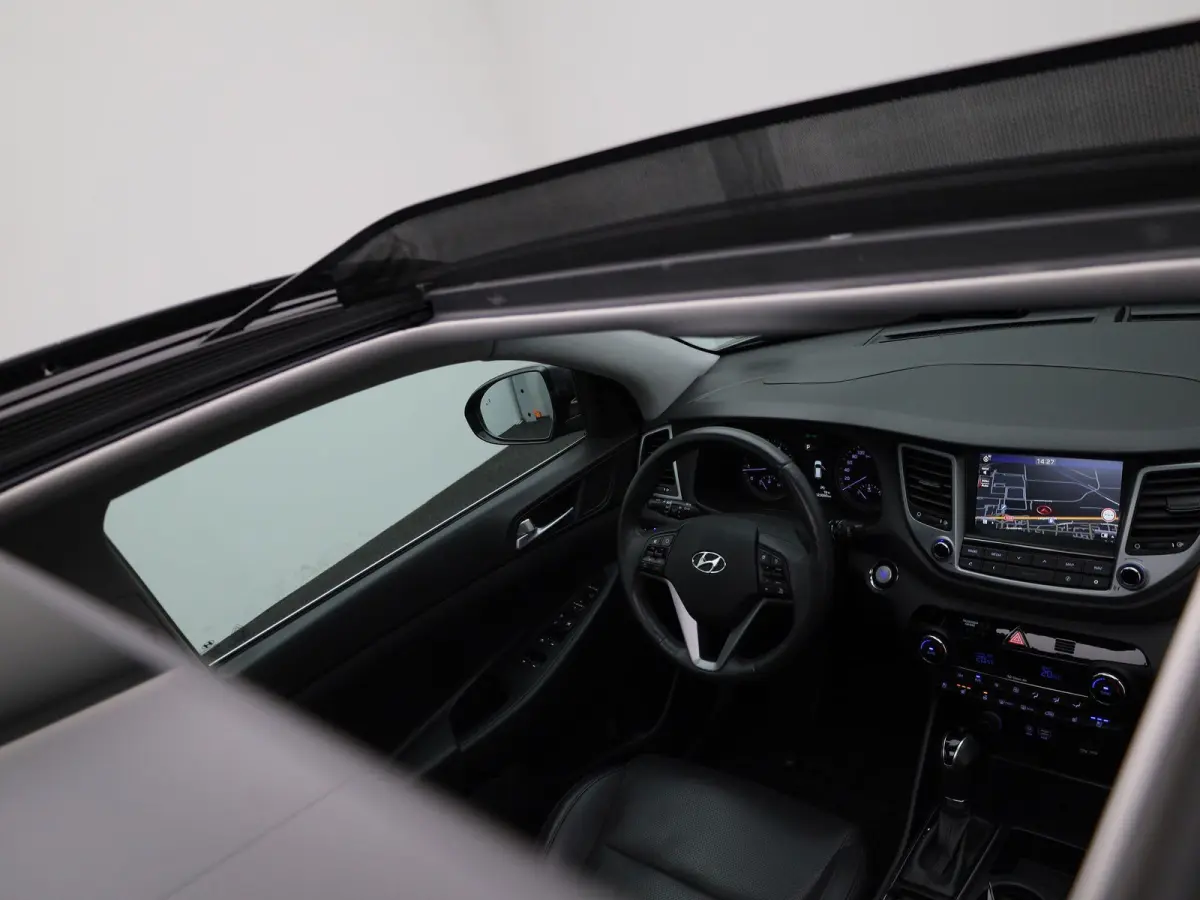 1.6 T-GDi Premium 4WD | Automaat | Achteruitrijcamera | Parkeersensoren | Panoramadak | Panoramadak | Stoelverwarming | Stuurverwarming |