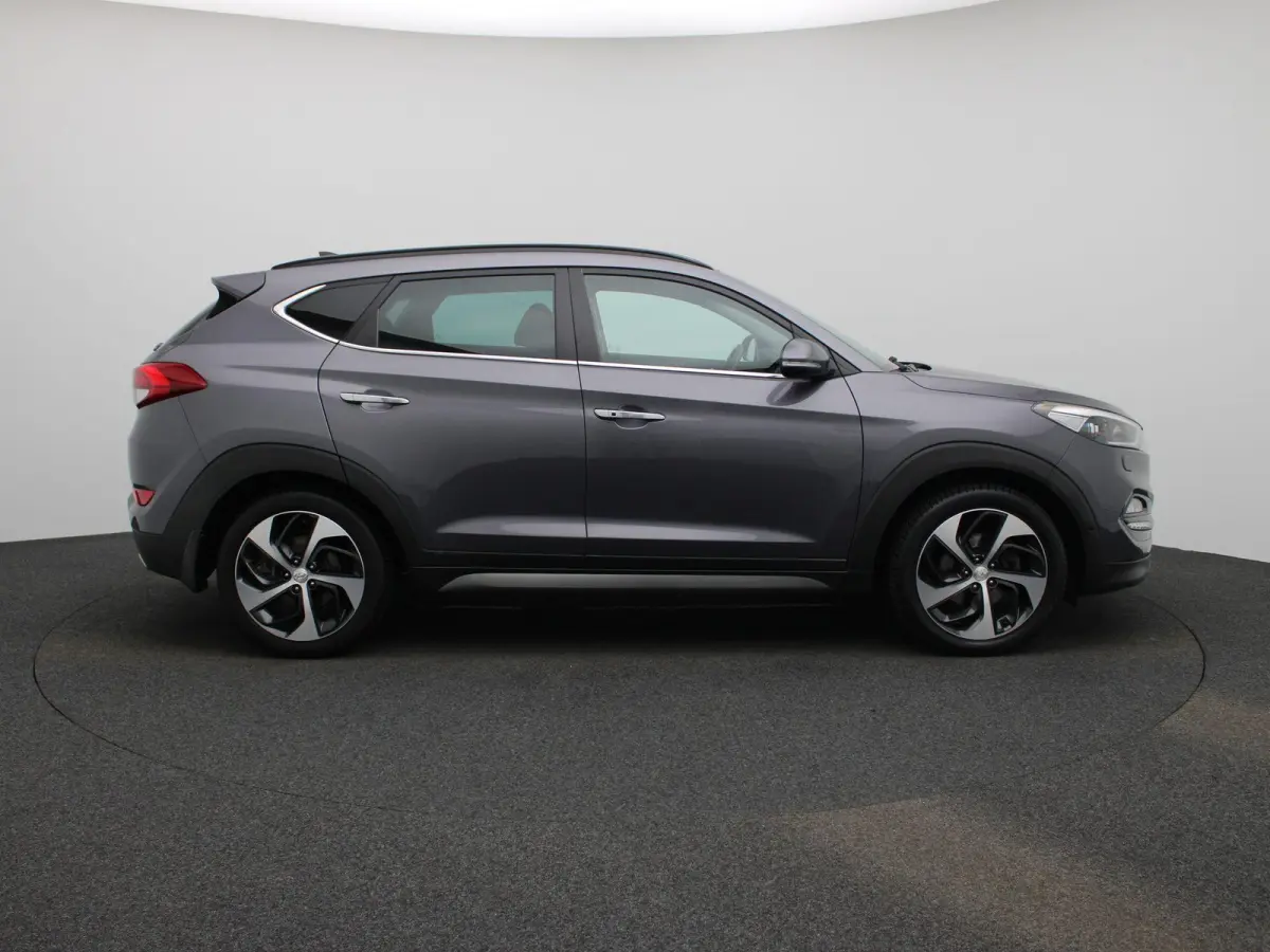 1.6 T-GDi Premium 4WD | Automaat | Achteruitrijcamera | Parkeersensoren | Panoramadak | Panoramadak | Stoelverwarming | Stuurverwarming |