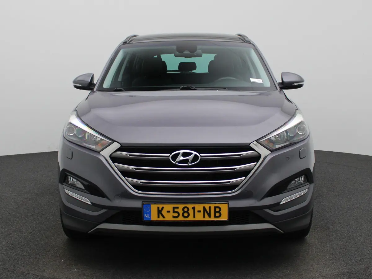1.6 T-GDi Premium 4WD | Automaat | Achteruitrijcamera | Parkeersensoren | Panoramadak | Panoramadak | Stoelverwarming | Stuurverwarming |