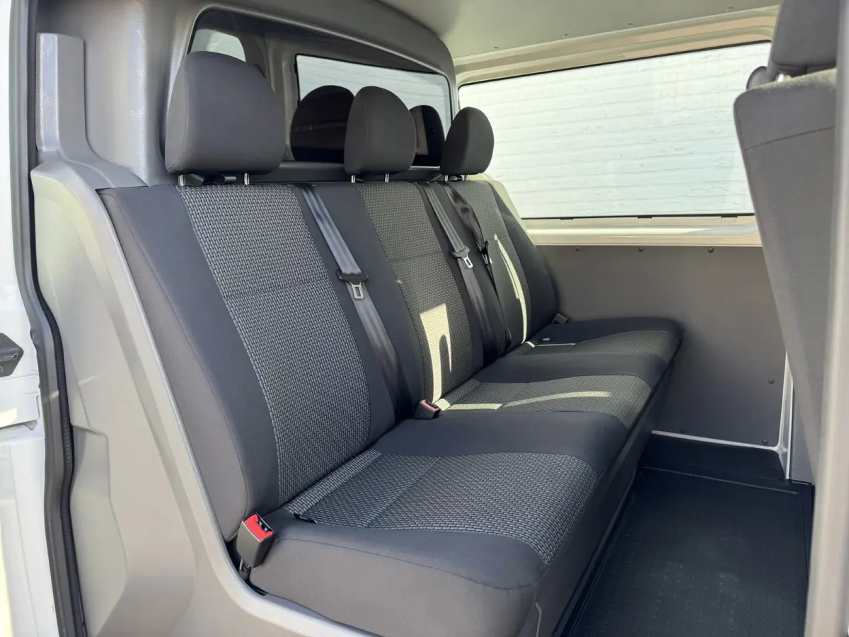 2.0 TDI L2H1 30 DC Highline Navi Airco Cruise Control Trekhaak Carplay All-Season Lat om Lat betimmert