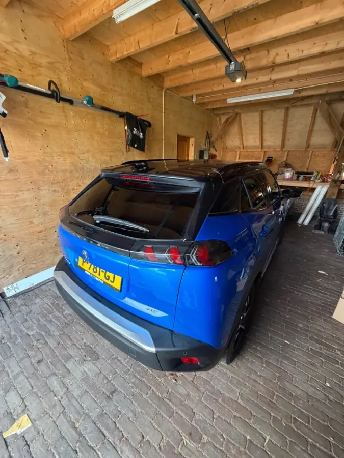 EV GT 50 kWh Panorama Dak | Camera | Parkeersensoren Rondom | Leder/Stof | Digitaal Dashboard | Digitaal Dasbhoard | 17" Lichtmetaal | Achteruitrijcamera | Afwijkende dakkleur | Airco (autom