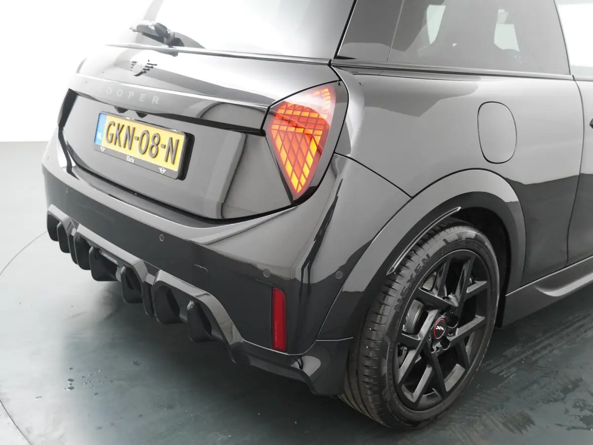 Cooper C JCW-trim | Pakket-M | Stuur- stoelverwarming | Schuif-kantel dak | Achteruitrijcamera |