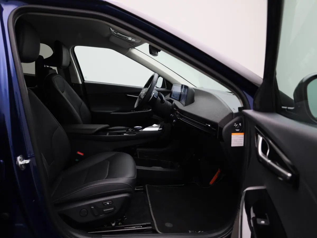Plus 77.4 kWh | 100% SOH | Voorstoelen Verwarmd/Gekoeld | Trekhaak | Achterbank Verwarmd | Warmtepomp | Adaptieve Cruise Control | Sfeerverlichting | Apple Carplay/Android Auto | Kunstledere