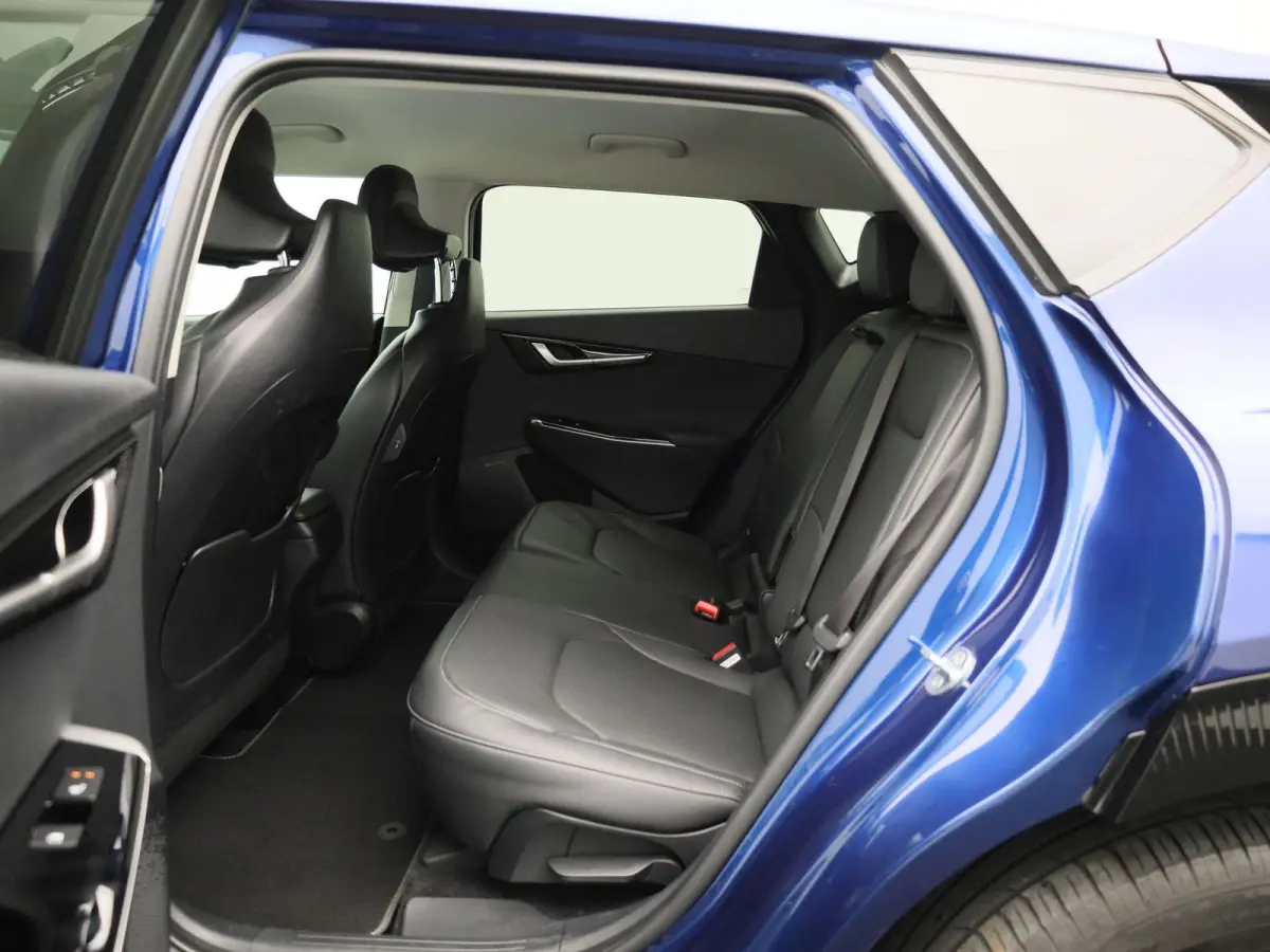 Plus 77.4 kWh | 100% SOH | Voorstoelen Verwarmd/Gekoeld | Trekhaak | Achterbank Verwarmd | Warmtepomp | Adaptieve Cruise Control | Sfeerverlichting | Apple Carplay/Android Auto | Kunstledere
